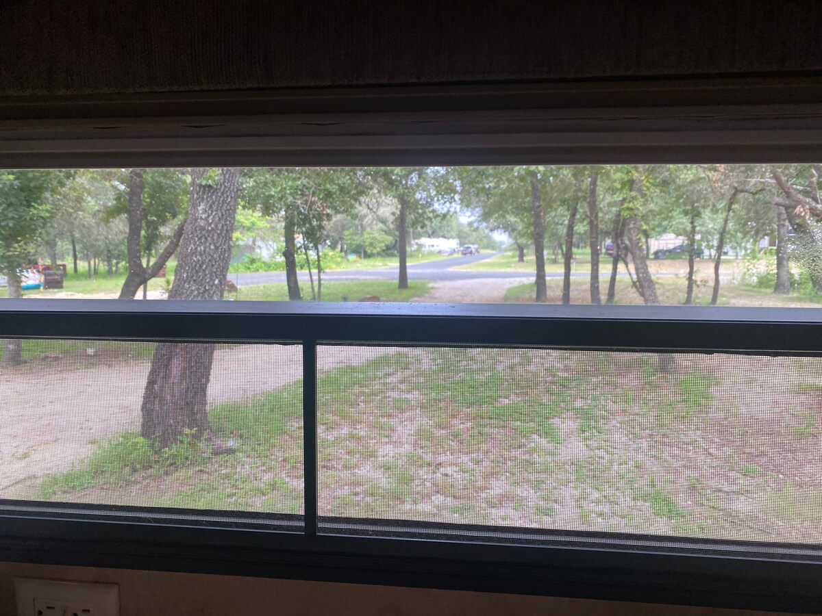 I bedroom cozy RV in country.