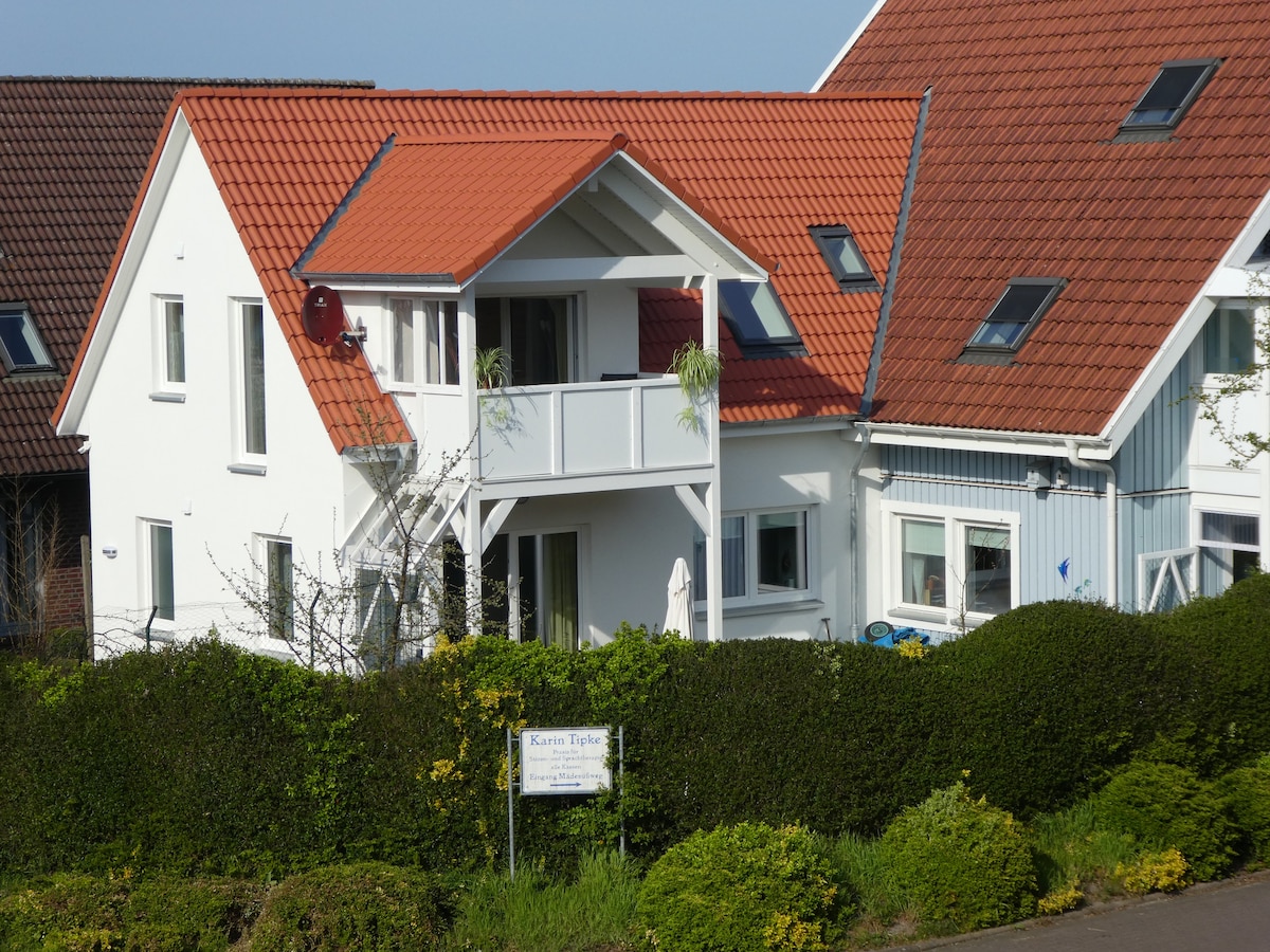 Kuschelige Dachgeschosswohnung mit Balkon: Ökohaus