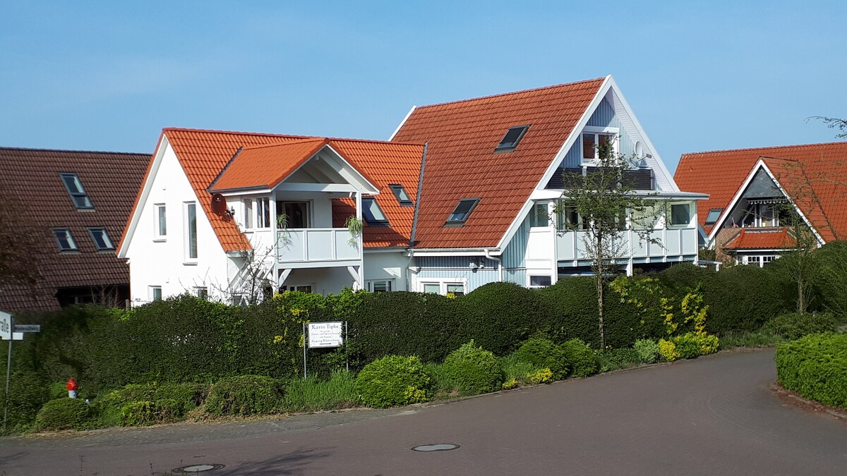 Kuschelige Dachgeschosswohnung mit Balkon: Ökohaus