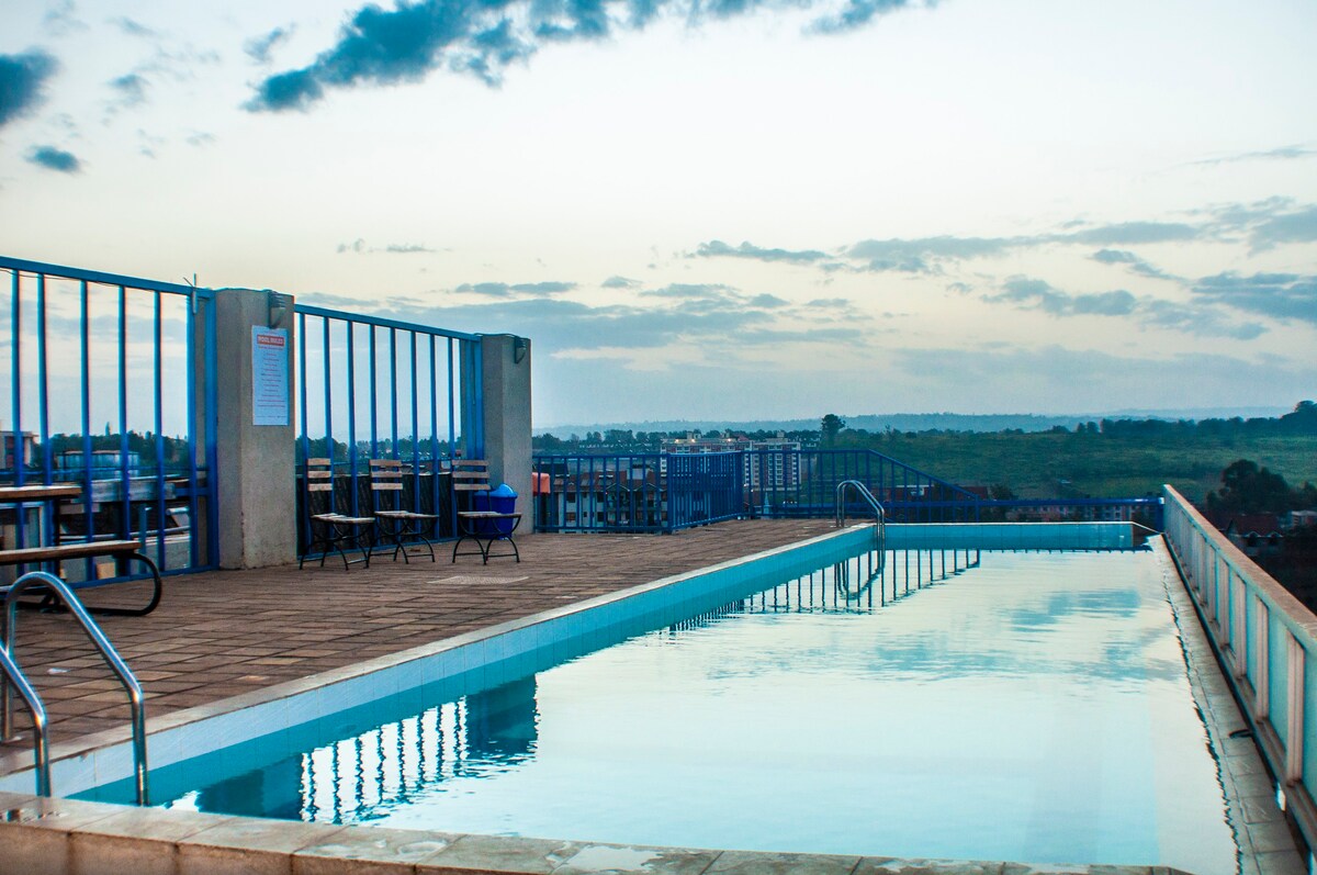 Azure- A cozy 1 bdr with a rooftop pool in Nairobi