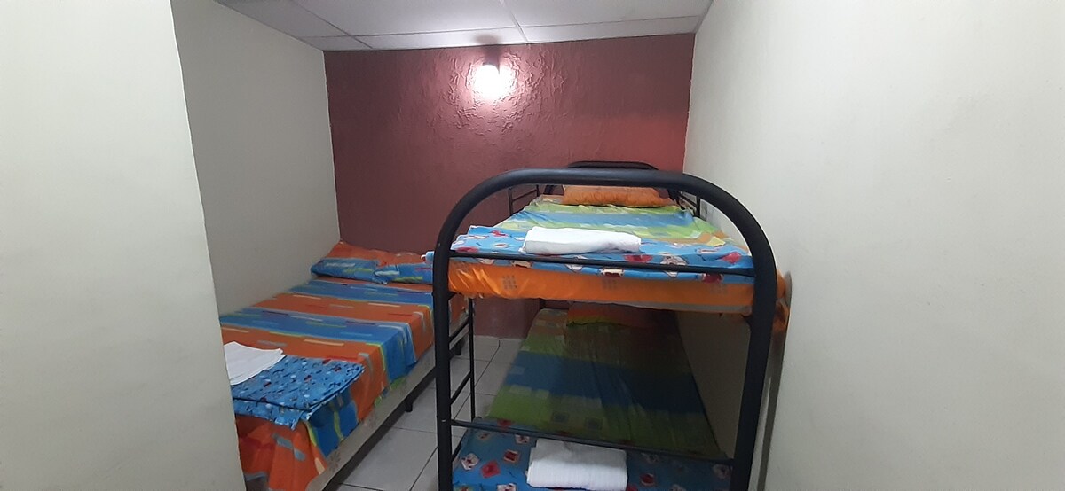 Bed in shared room by Santa Ana Volcano