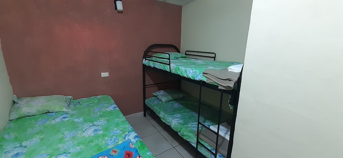 Bed in shared room by Santa Ana Volcano