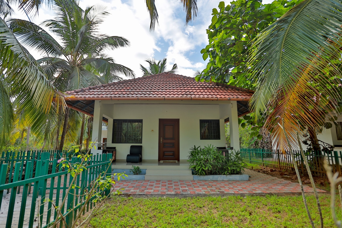 Relax in cozy cottages at Vayaloram Farm House - 1