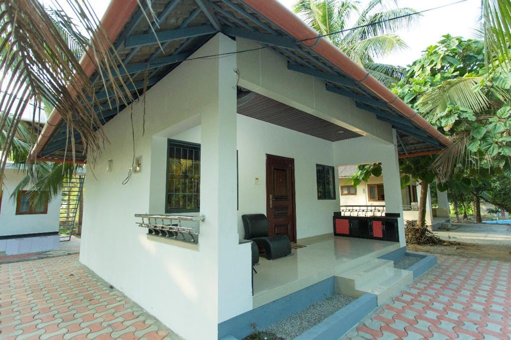 Relax in cozy cottages at Vayaloram Farm House - 1