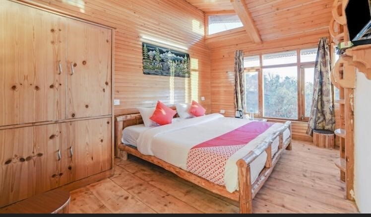 12 wooden rooms in lap of nature & ample parking.