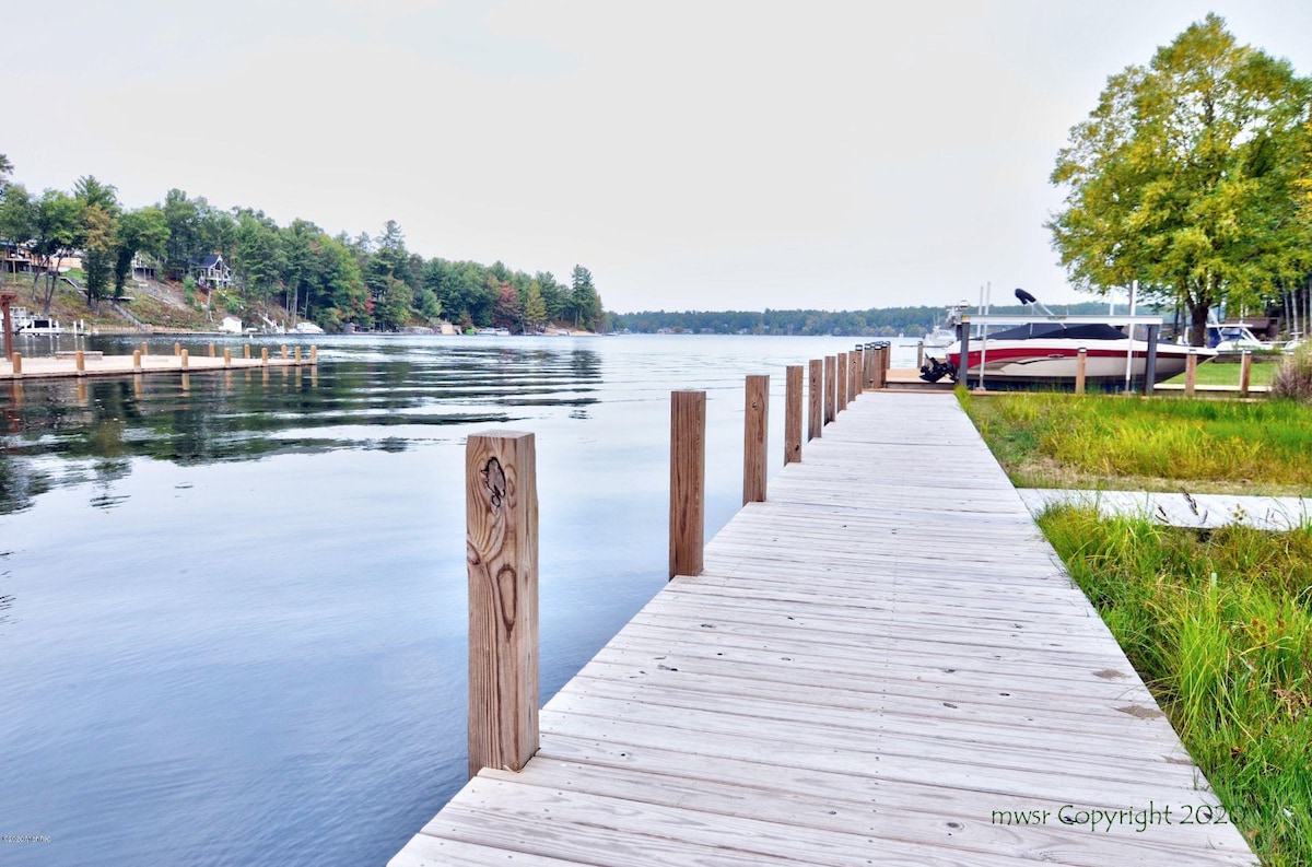 Pentwater Lakefront Getaway with Private Boat Dock