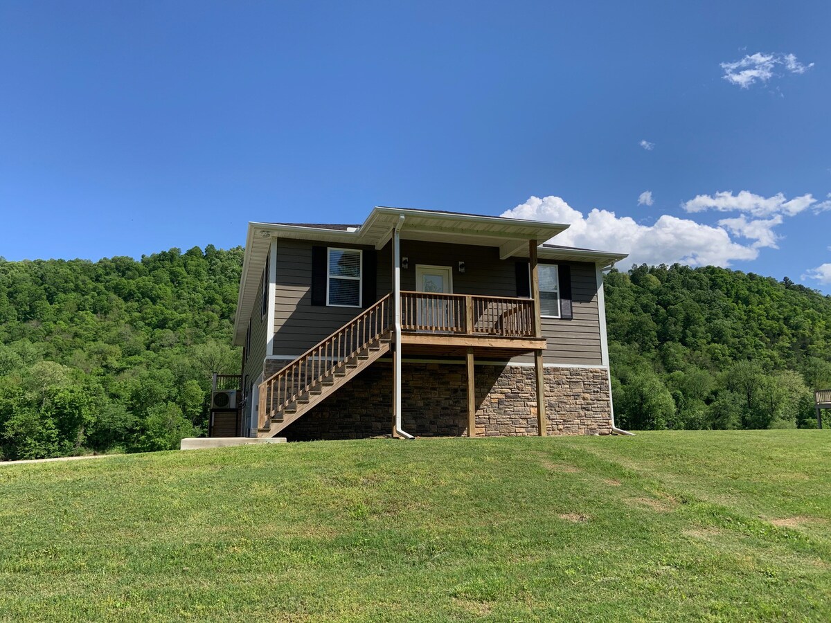 White River home w/ private steps to river's edge.