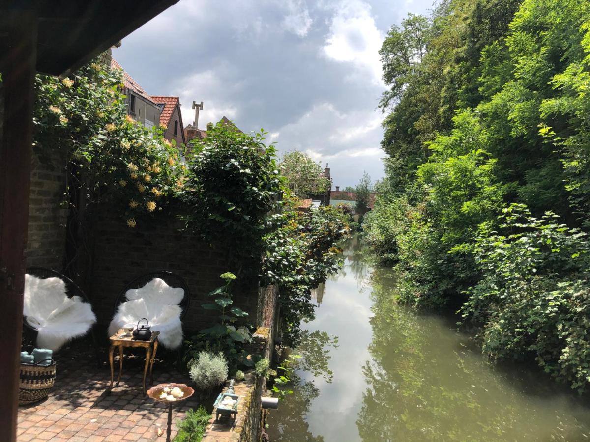 Bruges terrace by the water. Bru-Lagoon guesthouse