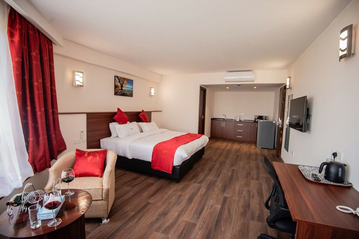 A spacious charming studio at Crossroads Hotel