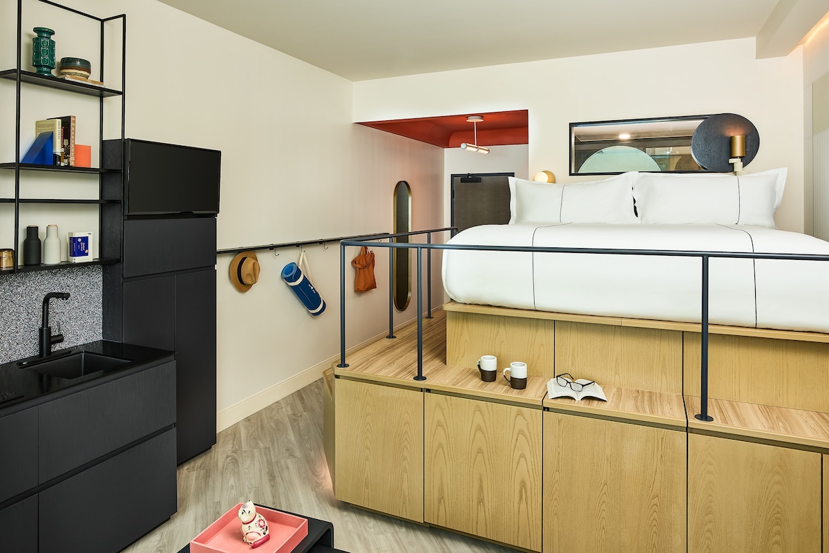 Enjoy an apartment-style room in the Catbird Hotel