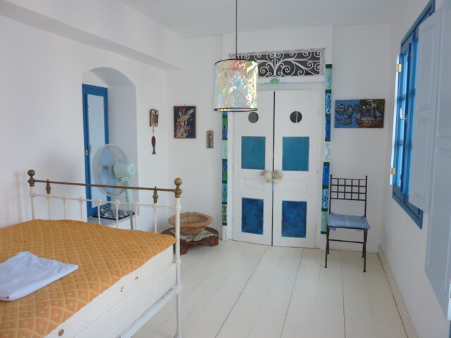 cheerful  blue white greek house with  sea view