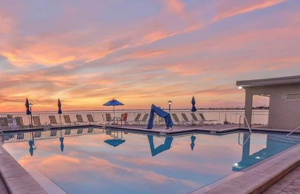 2 Bed Condo with Balcony Facing Pool and Sunsets!