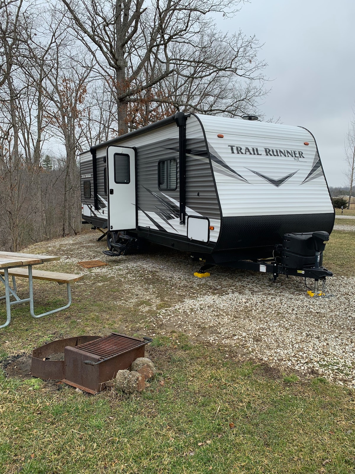 Delightful RV with campground amenities.