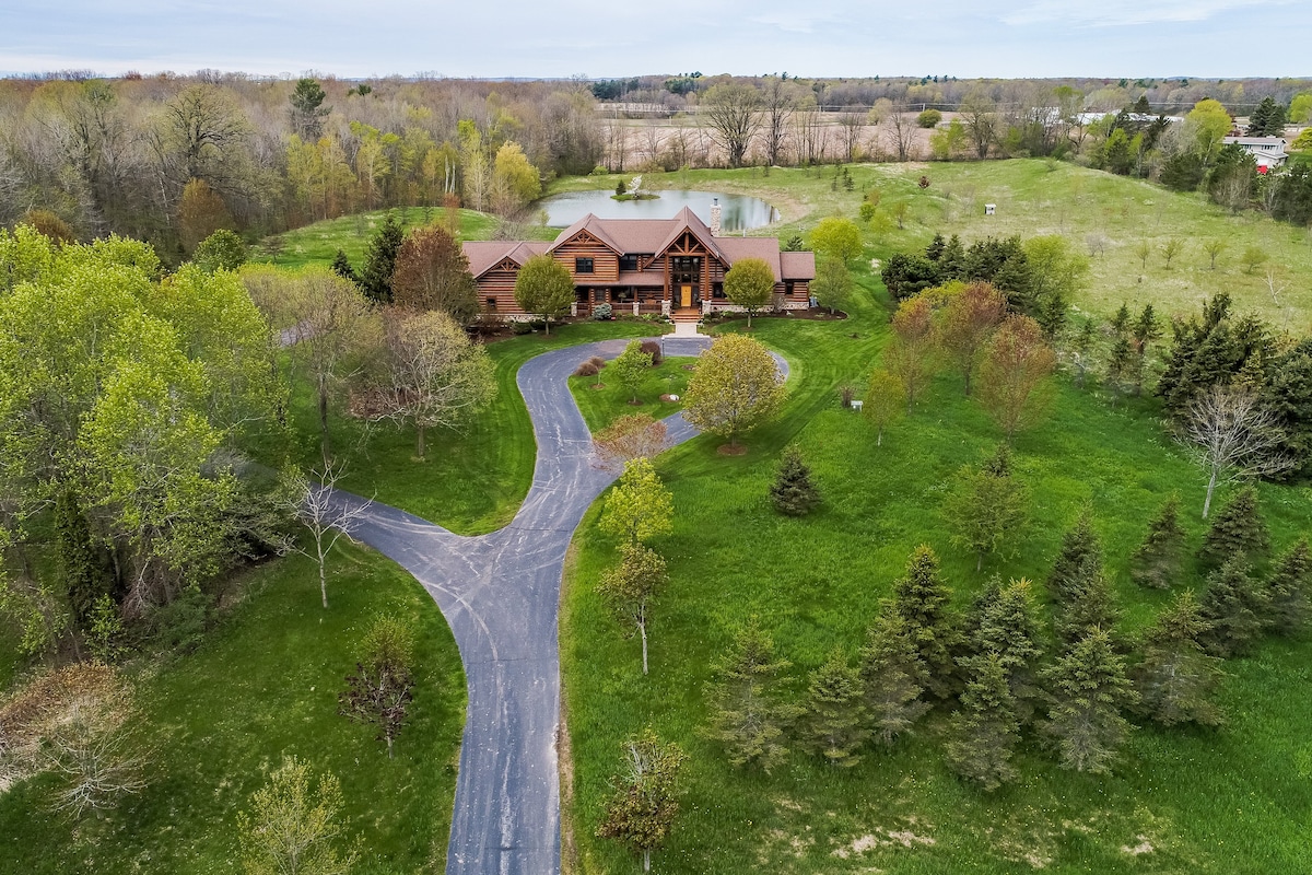 Private Log Home Retreat on 15 Acres with a Pond!