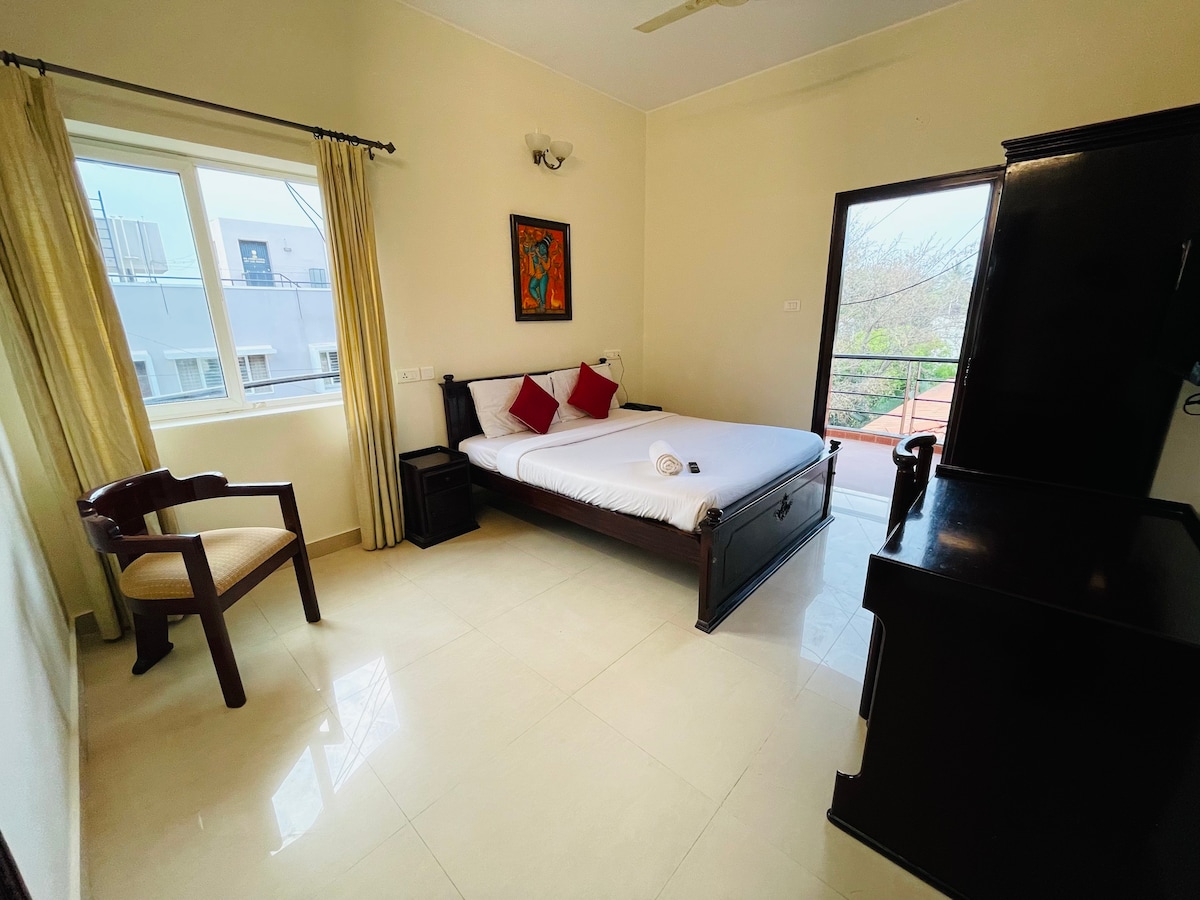 Charming Room with Balcony at Sanctum Indiranagar