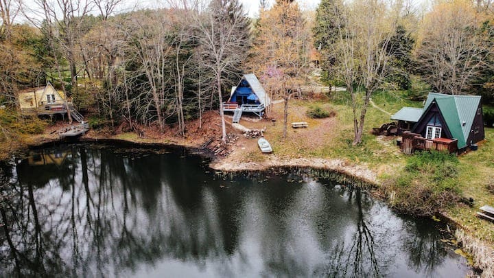 Three A-frame Cabins, a private Pond, row boats!
