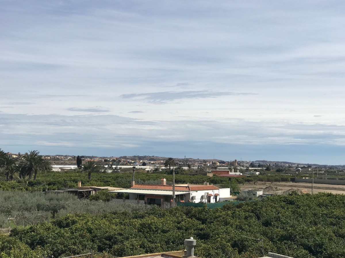 Casa rural con sol y sombra