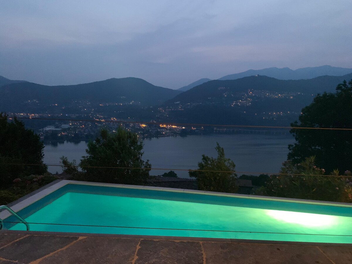 可欣赏湖景和泳池景观的蒂西诺风格别墅
