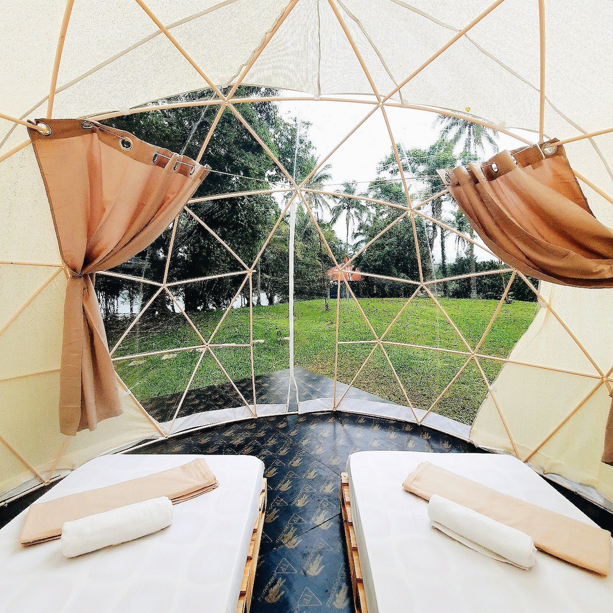 Geodesic Dome Tent Nestled in the Trees, Lake View