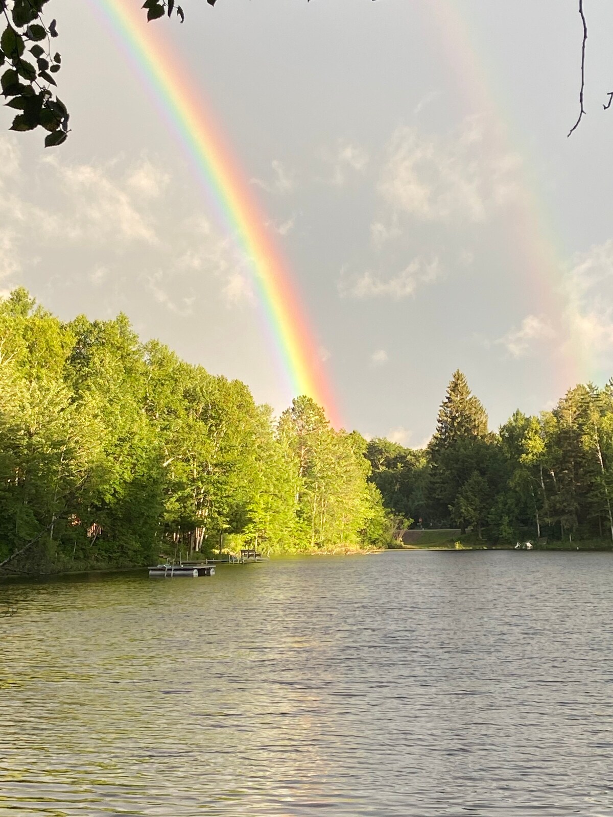 Lakefront cottage on a small quiet no wake lake .