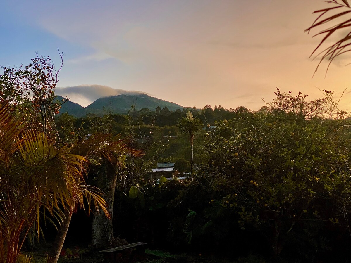 House with spectacular mountain and city views.