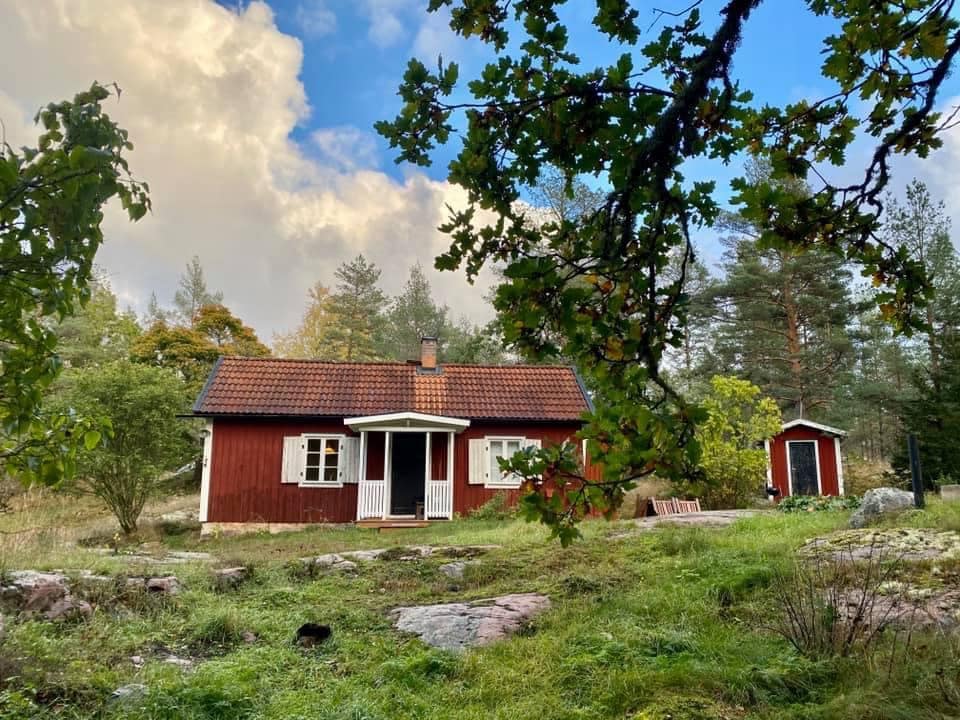 Our classic red cottage in the woods