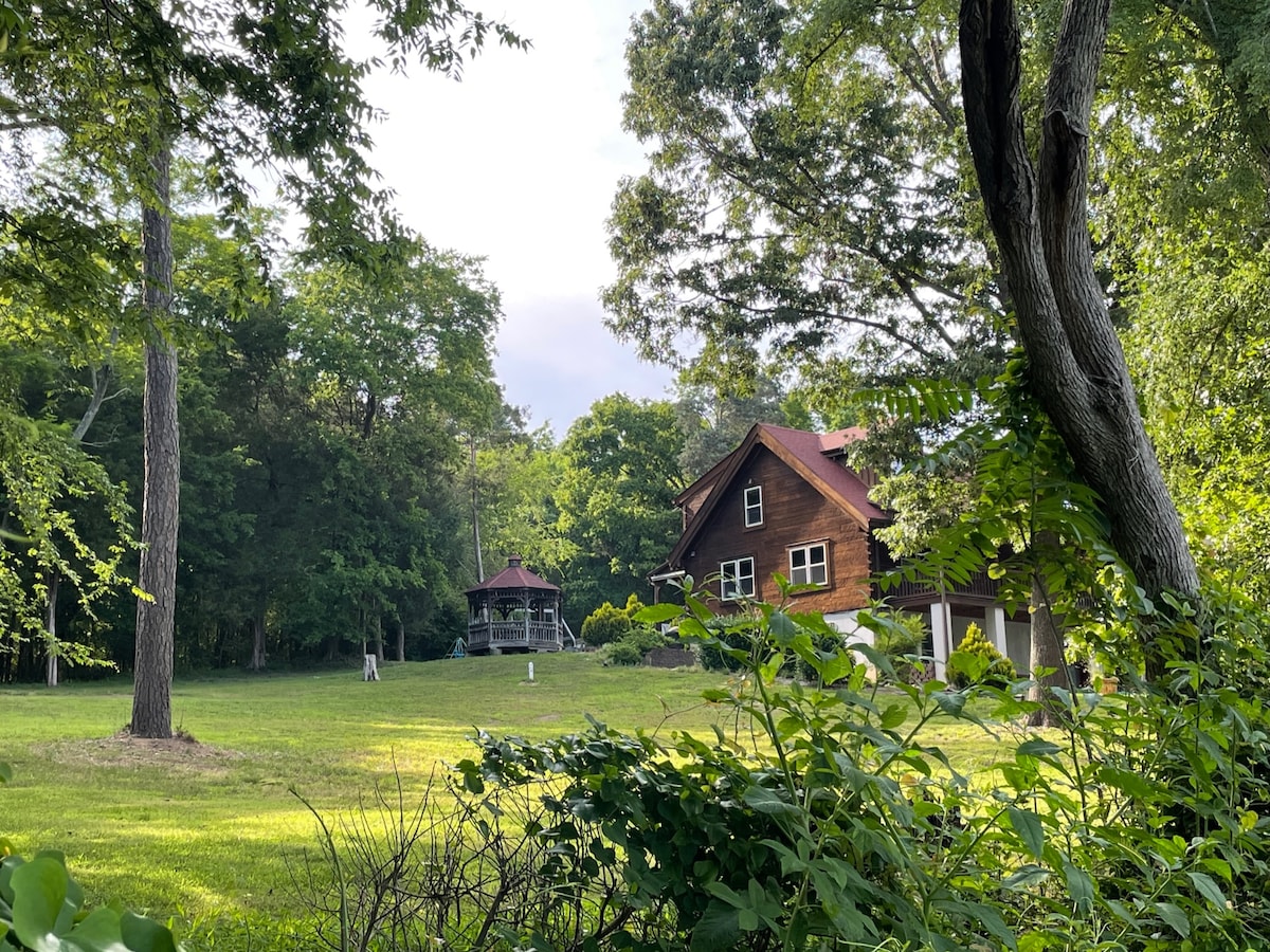 One-of-a-kind Log Cabin with river access