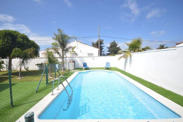 Chalet con piscina y jardín privados en el Palmar