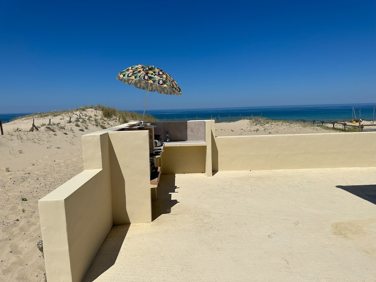 Maison en bord de mer sur la plage