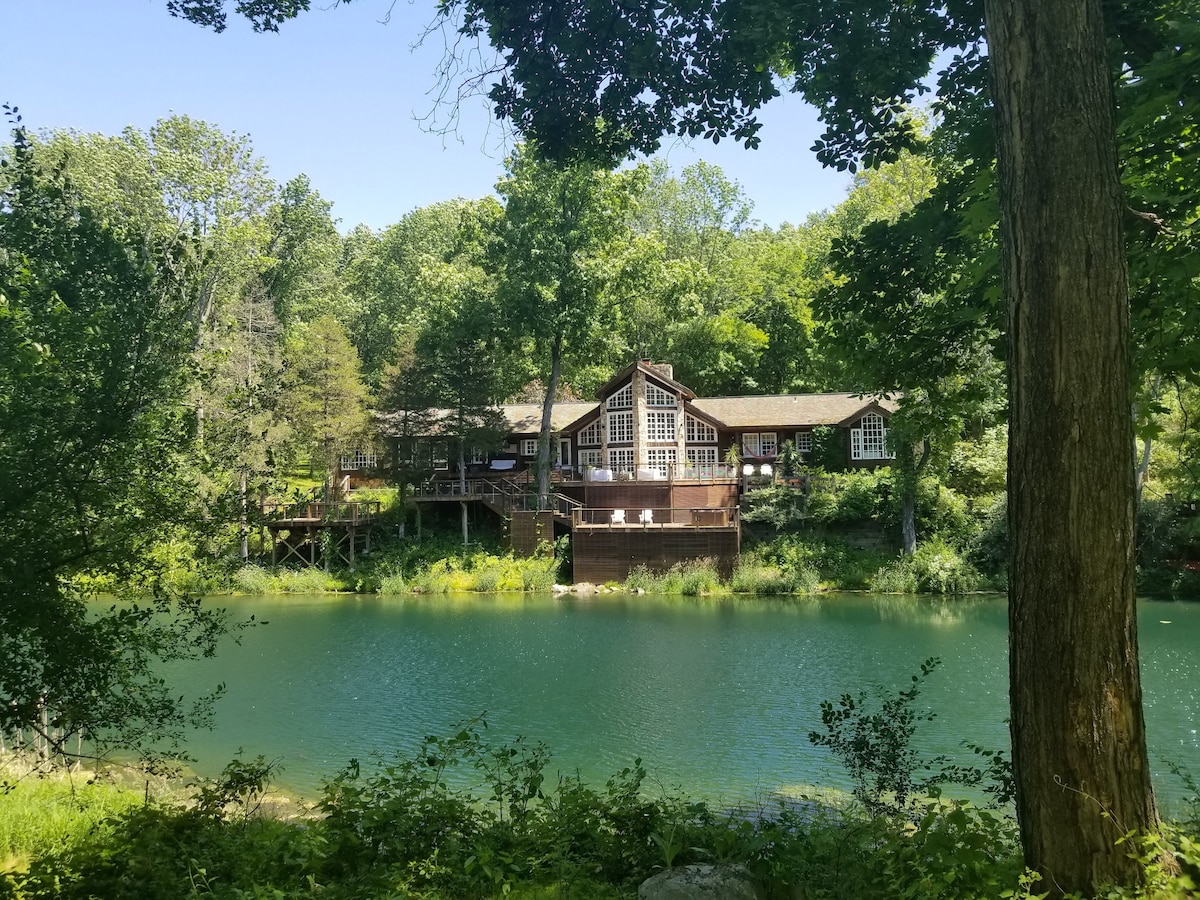 17-acre park-like compound w private lake