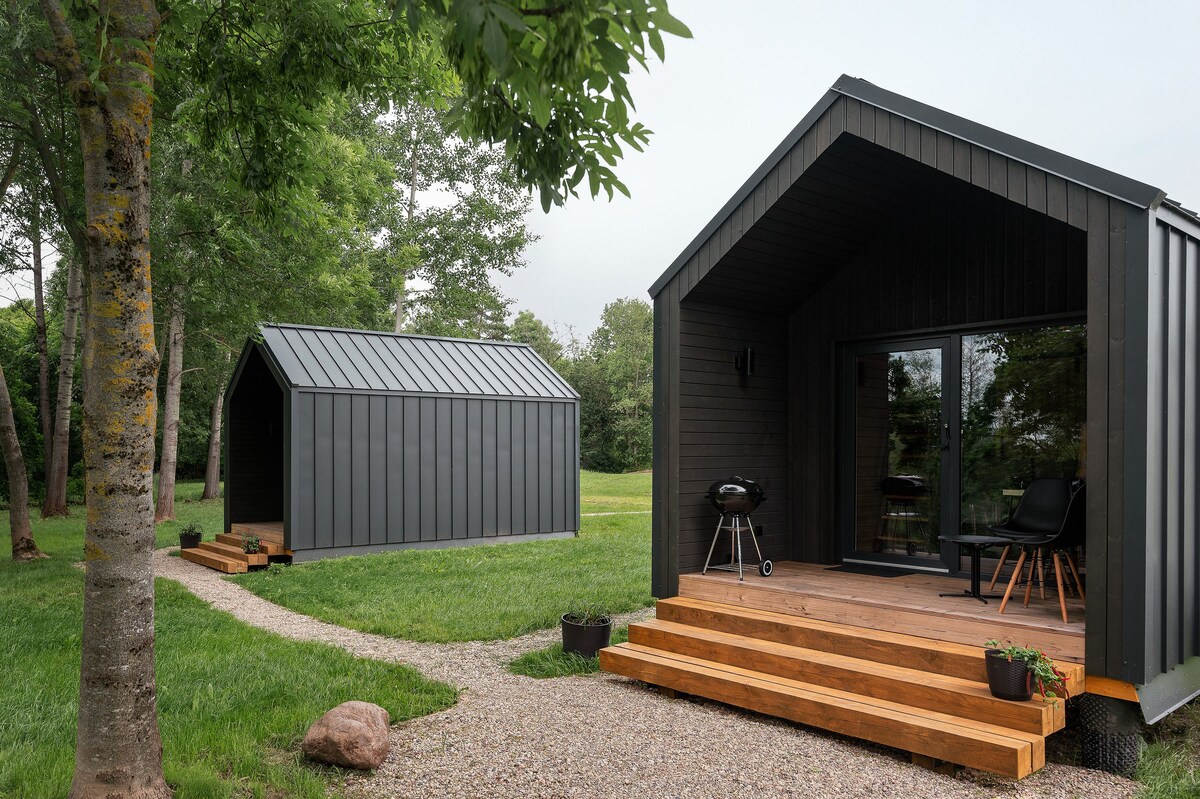 Rest Green microhouse on a river cliff!