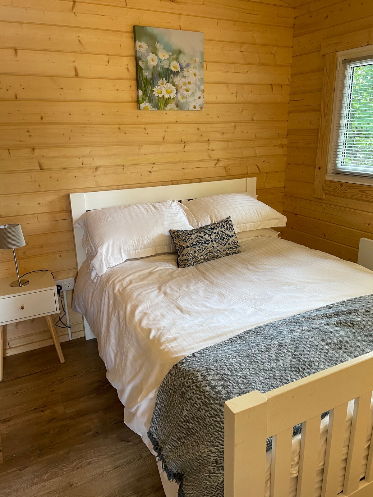 Cosy cabin on working dairy farm