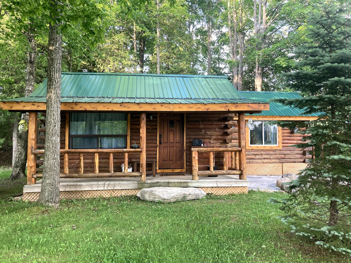 Unique, very private log cabin on private lake.