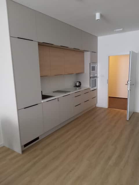 Moderní apartmán až pro 4 osoby, s vlastní kuchyní
