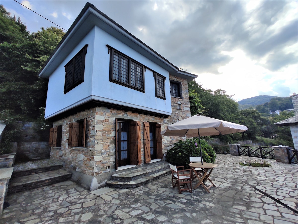 Cozy Blue Stone House with a stunning Sea View.