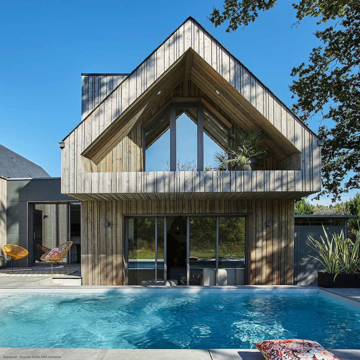 Charmante maison bois avec piscine.