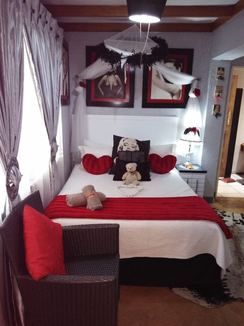 Double Bed and Bathroom in Established Guesthouse