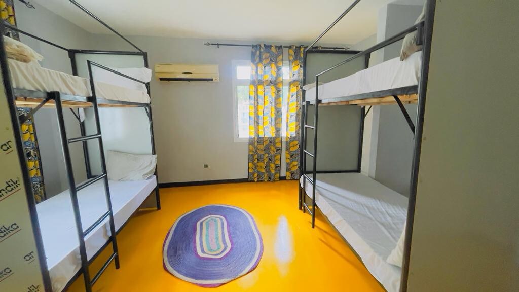 Affordable Hostel in Masaki: Bunk Bed Room w/ Pool