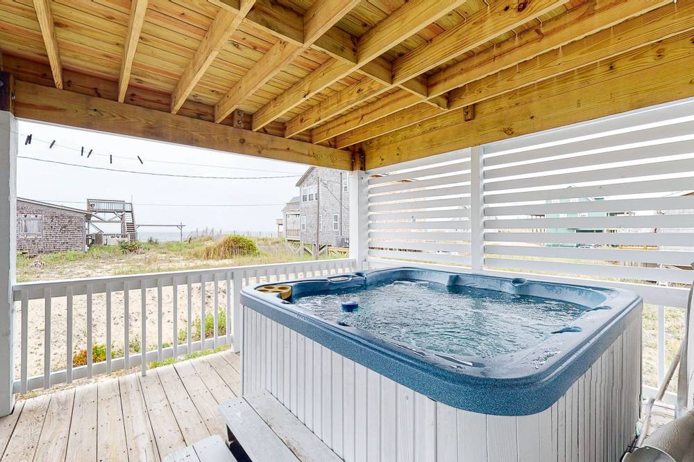 Semi-oceanfront with HOT TUB, steps to beach!