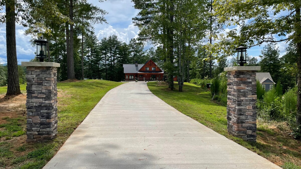 Log cabin house with lakefront and boat dock