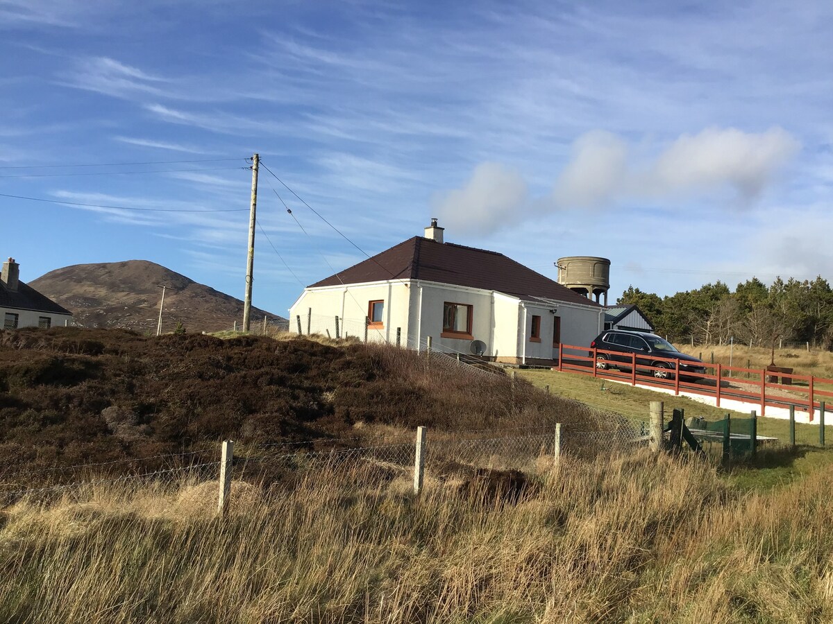 Sandy beaches, wild walks, cosy home, peaceful.