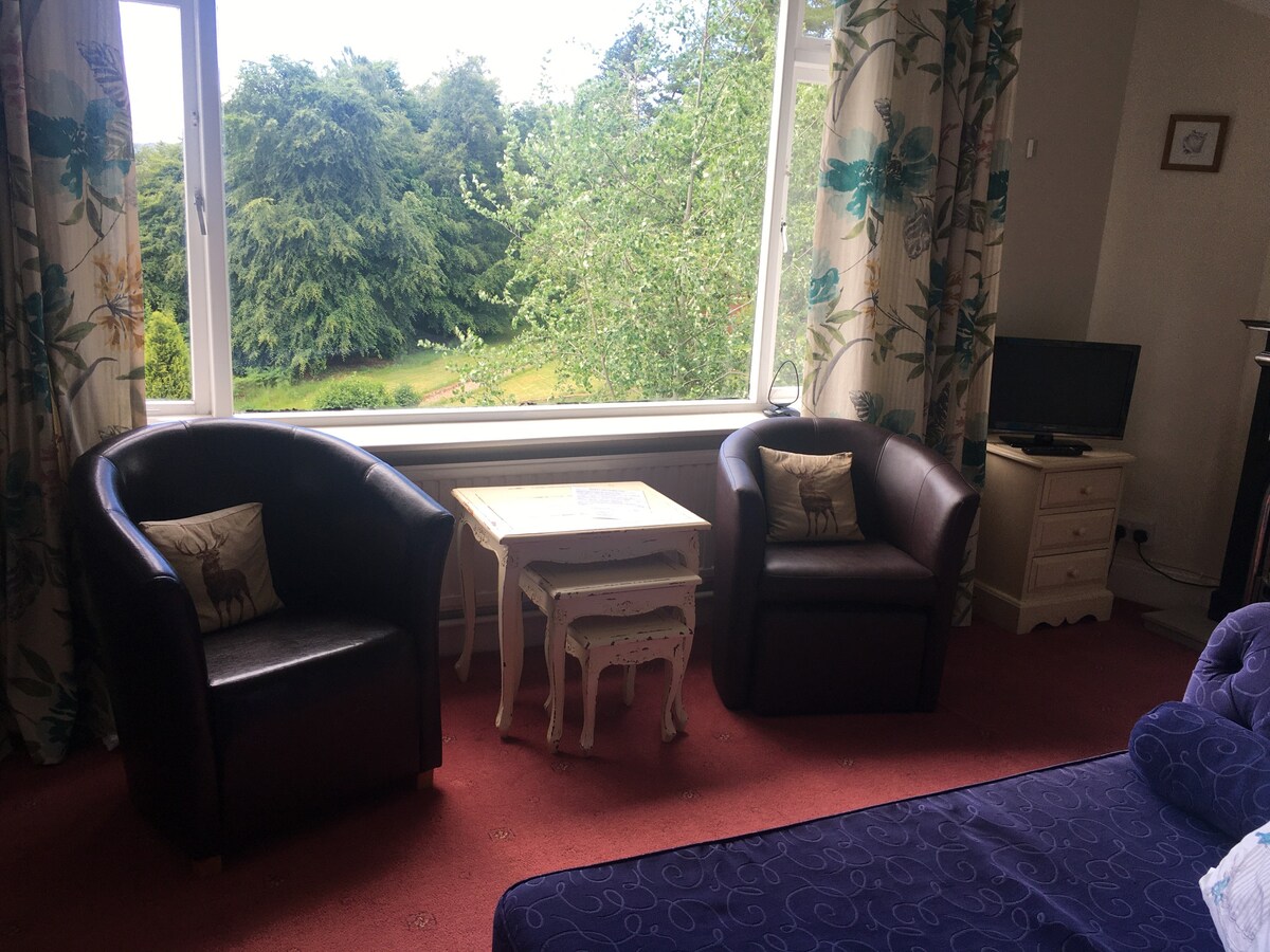 Spacious en suite family room with scenic views