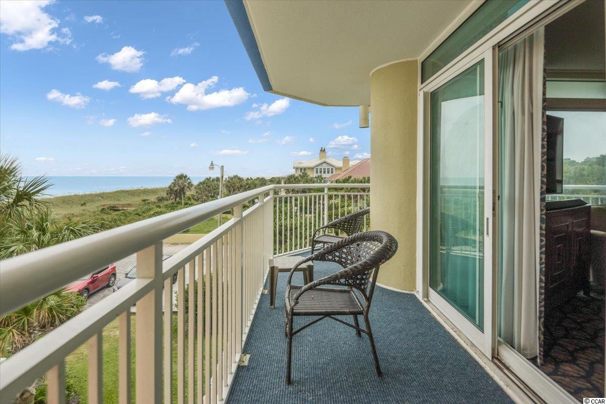 Beachfront Bliss: 2-BR Deluxe Condo, 2 Balconies