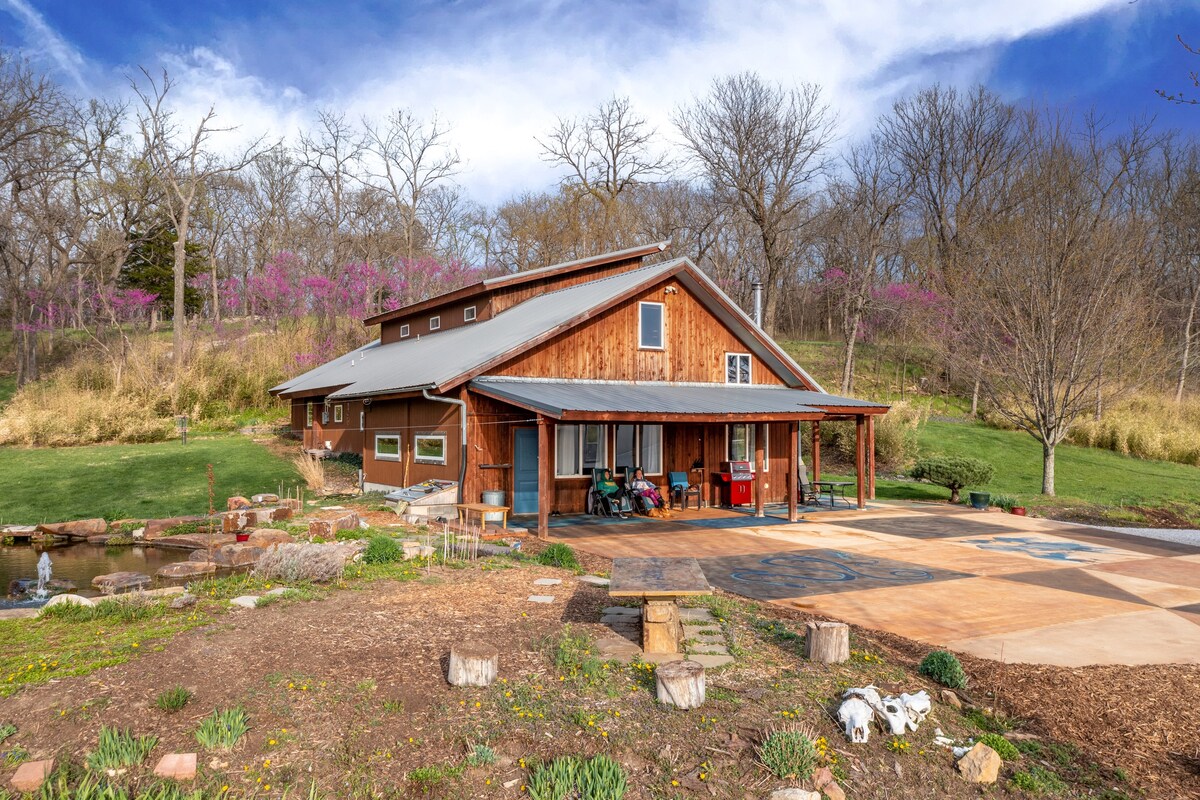 Modern home on 10 acres with natural swimming pool