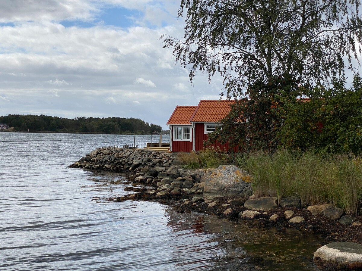 Stuga med egen sjötomt