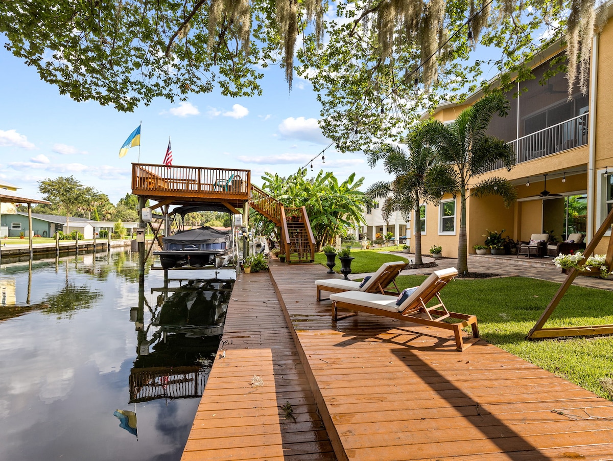 Luxury Waterfront Pool Home w/spa & deep canal