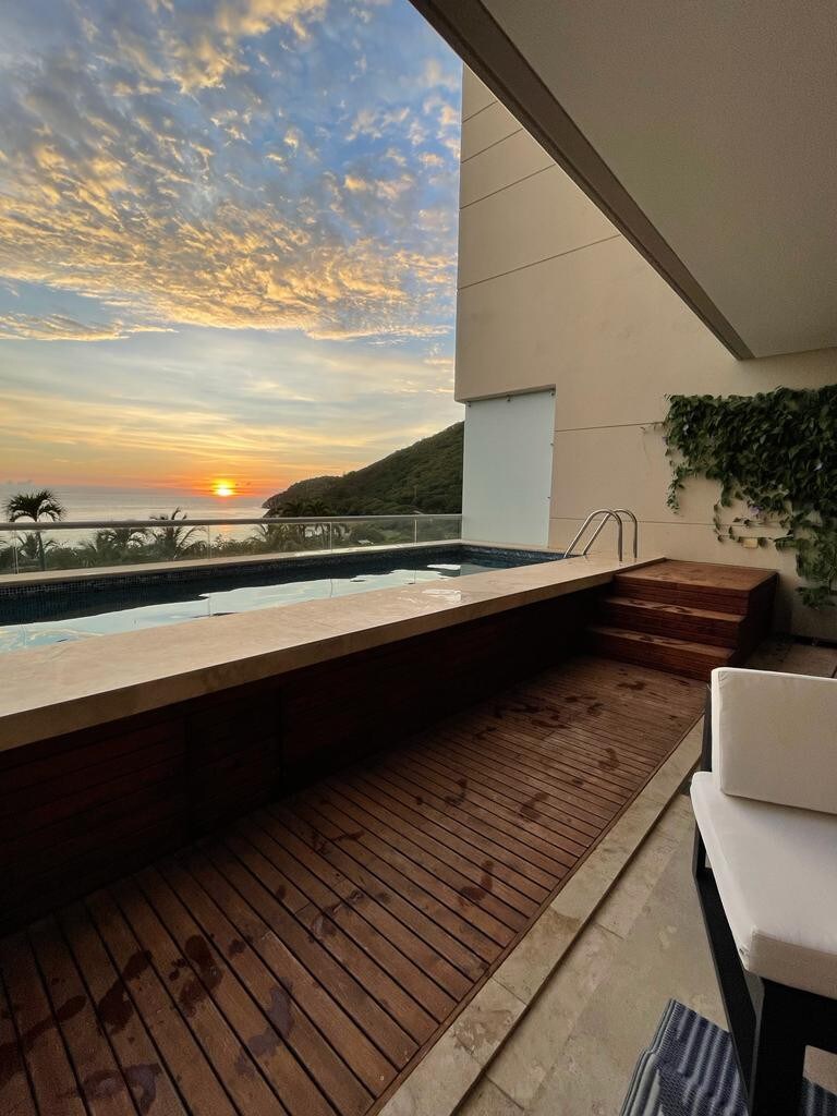 Luxury beachfront condo with private pool