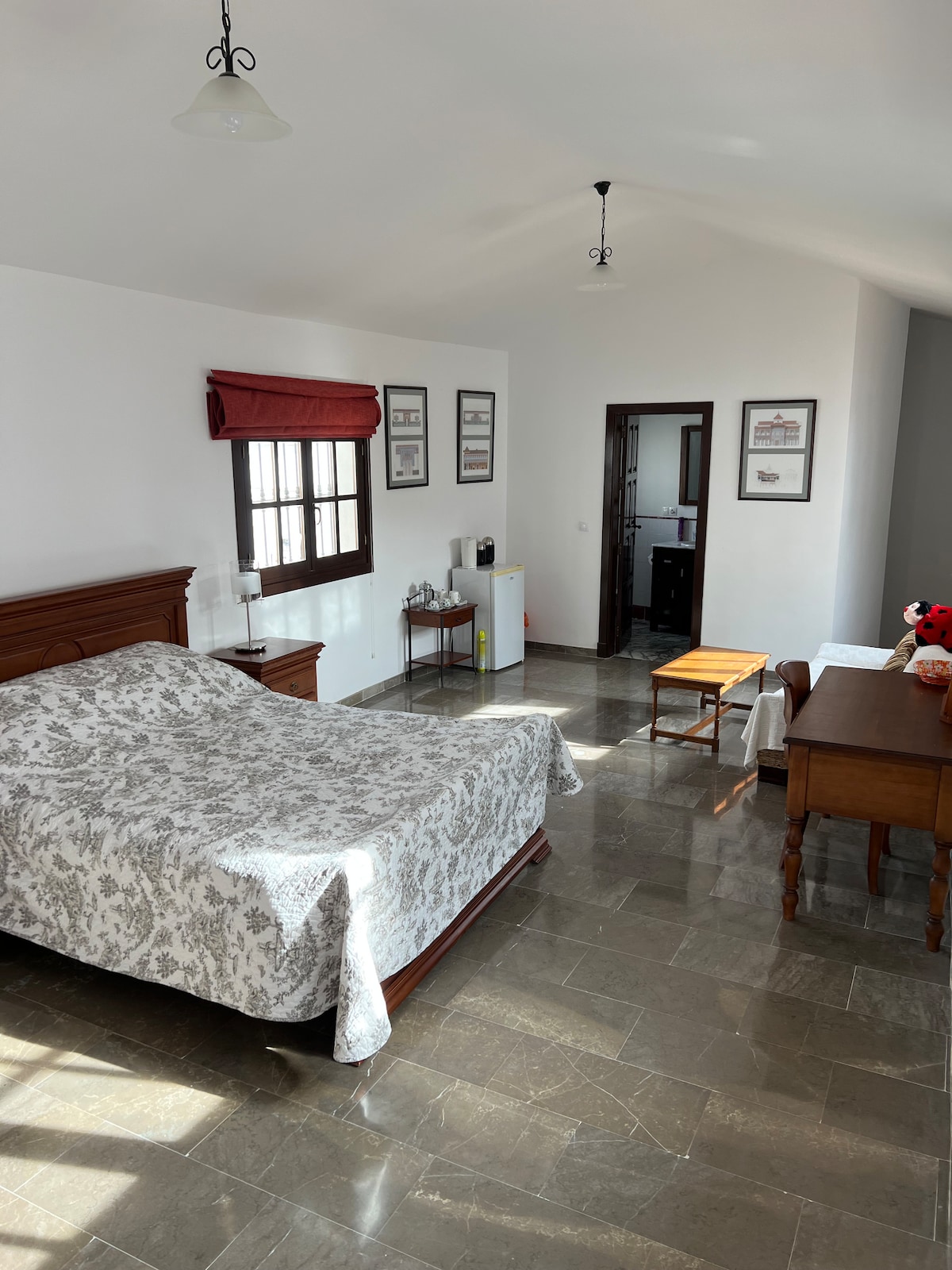 Private room set in traditional Spanish townhouse.