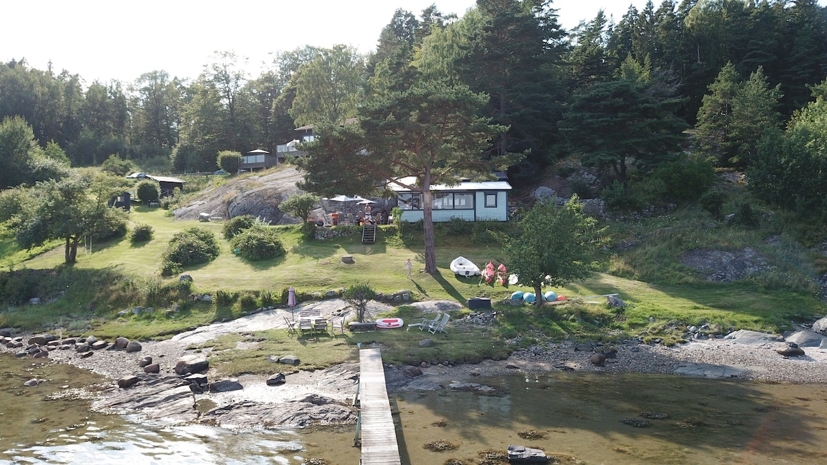 Extraordinärt boende - 3 hus & egen strand