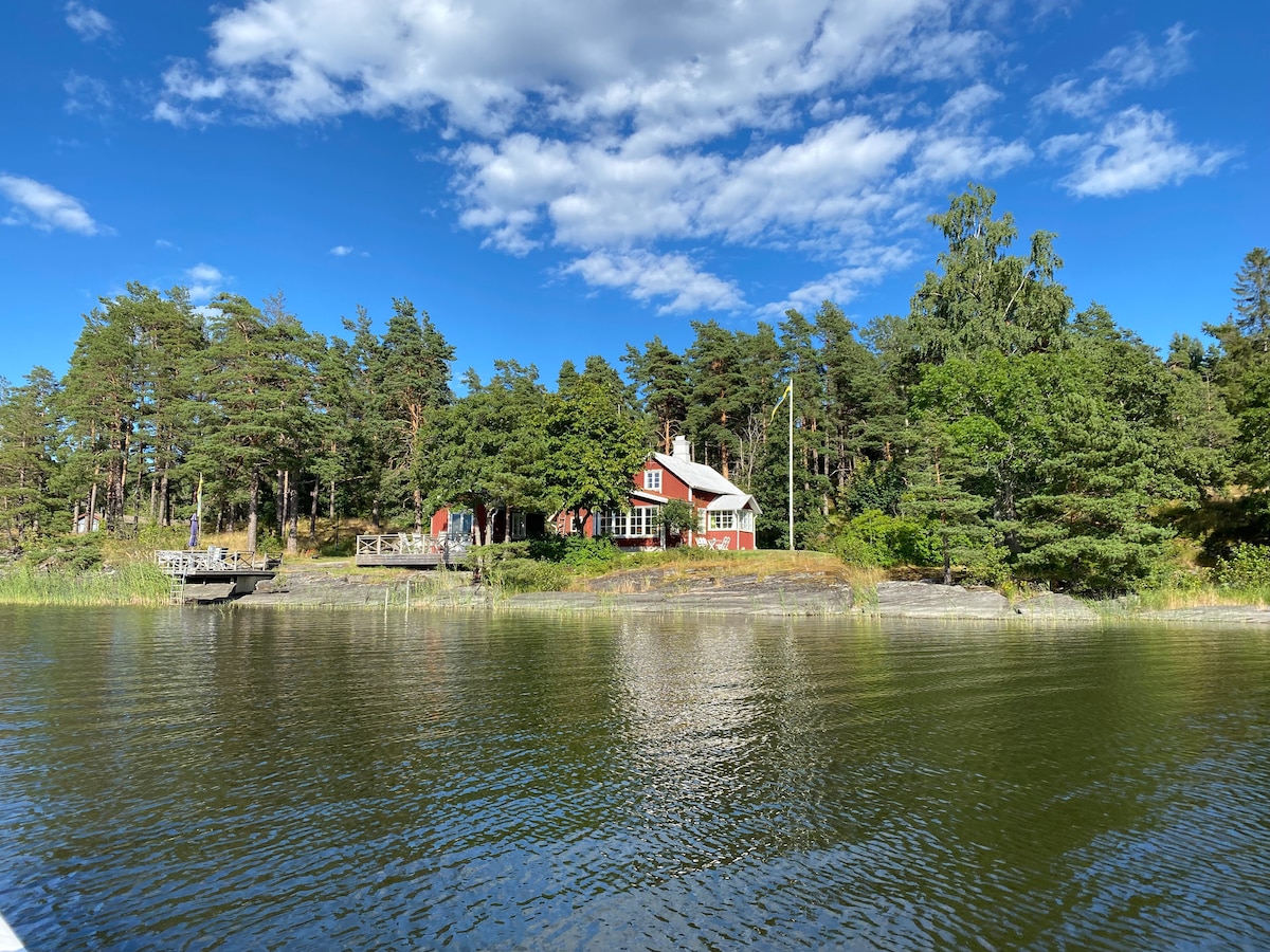 Lake house with sunset view